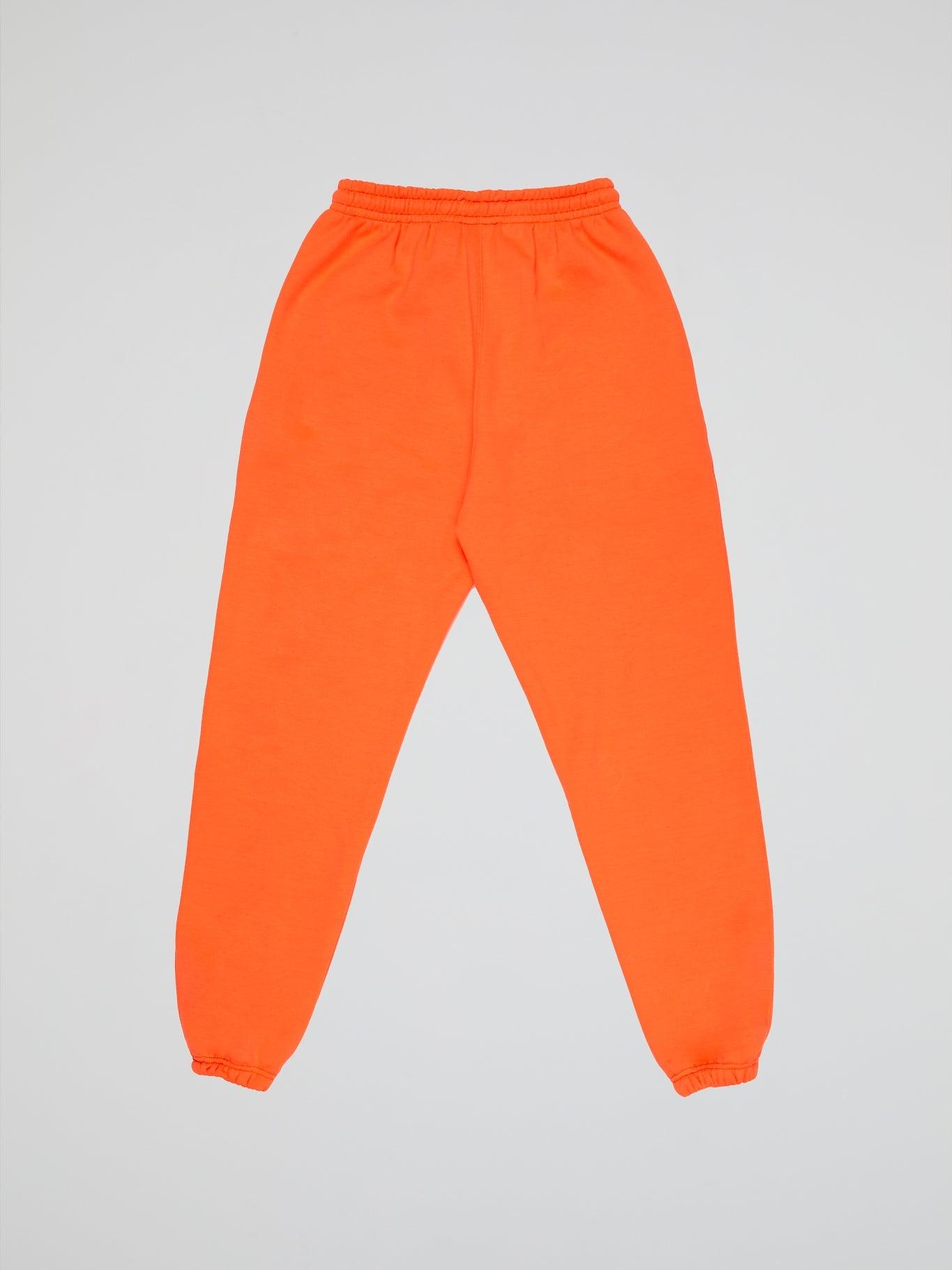 NEON ORANGE PANTS BHYPE LOGO ESSENTIALS - B-Hype Society